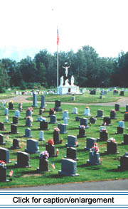 Madawaska's Saint Thomas Aquinas cemetery lies just across the Saint John River from Edmundston's Immaculé Conception cathedral.