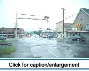 Railroad and highway intersect at the corner of Maine and Market streets in Fort Kent.