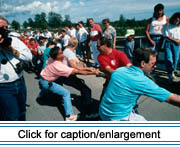 Tug-of-war between citizens of Van Buren, Maine and St-Léonard, New Brunswick on the international bridge during the 1991 Grand Riviére Festival.