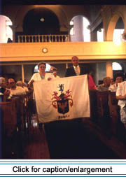 The "Acadian Mass" at St. David Catholic Church, an event held annually during Acadian Festival week. Members of each family which has previously held a reunion during the Acadian Festival carry in their family banner and lay it at the foot of the altar. 