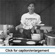 Rachel Walsh of Madawaska, Maine, prepares ployes during the 1991 Acadian Festival.