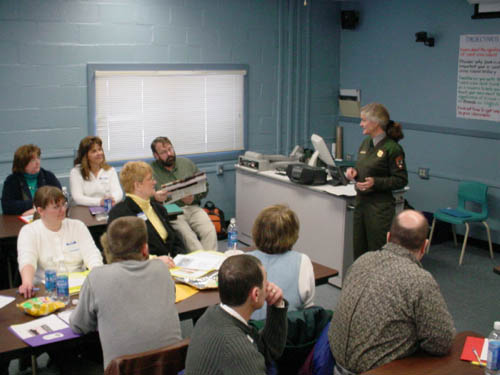 National Park Service ranger Meg Scheid talks to Valley teachers about the St. Croix International Historic Site at a 2004 professional development workshop at the Madawaska Middle/High School.