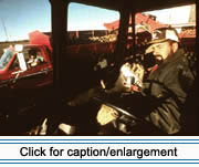 Gerald Ouellette drives a harvester at Rocky Beach Farms in St. David, ME. Photograph Paula Lerner, 1995.